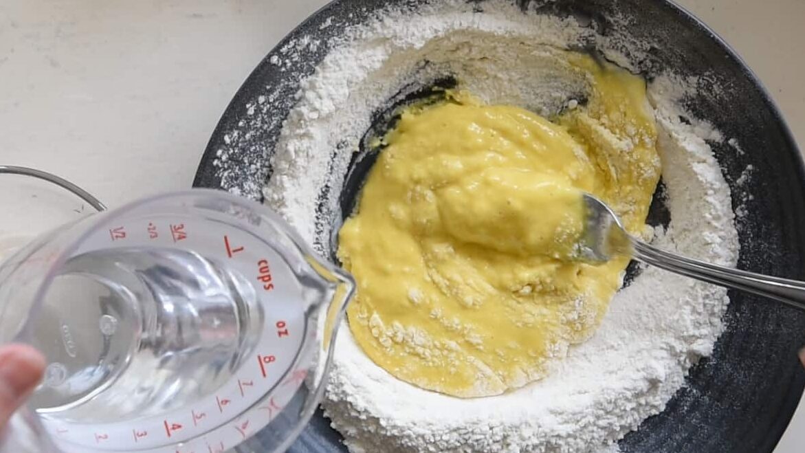 Add enough water to the batter to keep it fluid but not too much