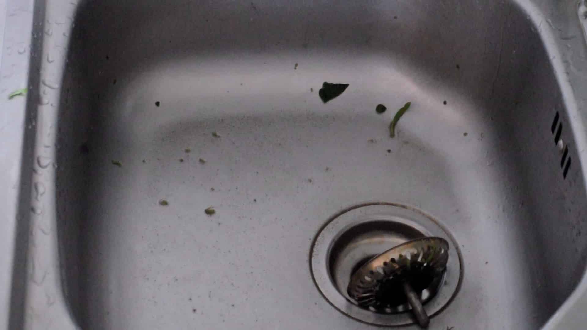 dirt at the bottom on the sink