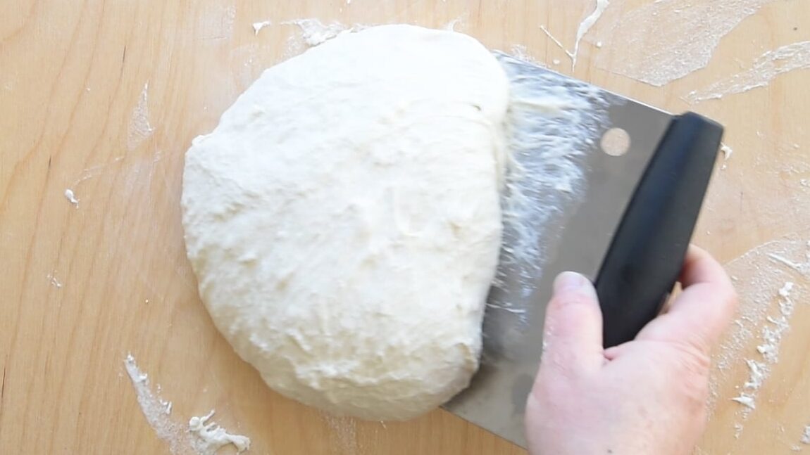 Rotate the dough and repeat the fold