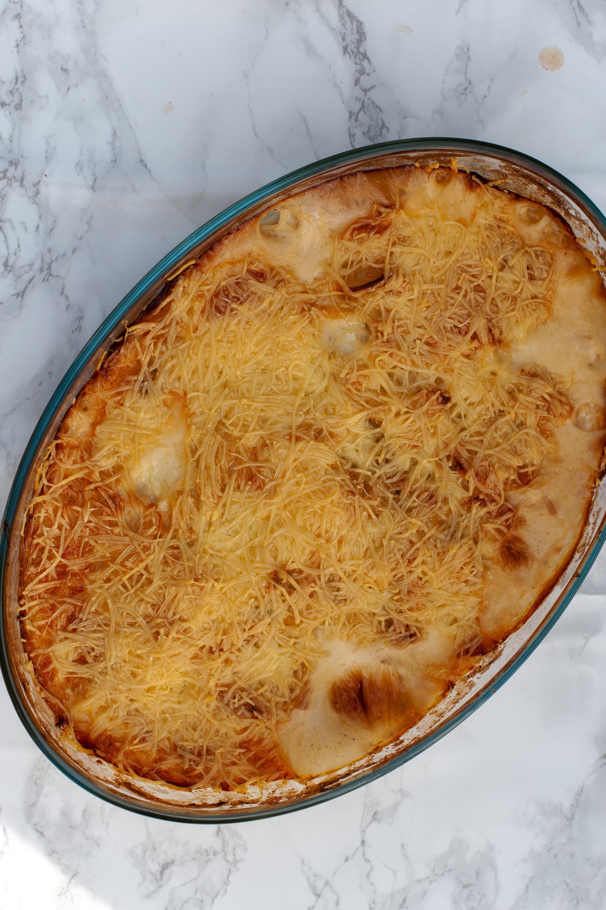 Quick Easy French Dauphinoise Potatoes Au Gratin topped with cheese