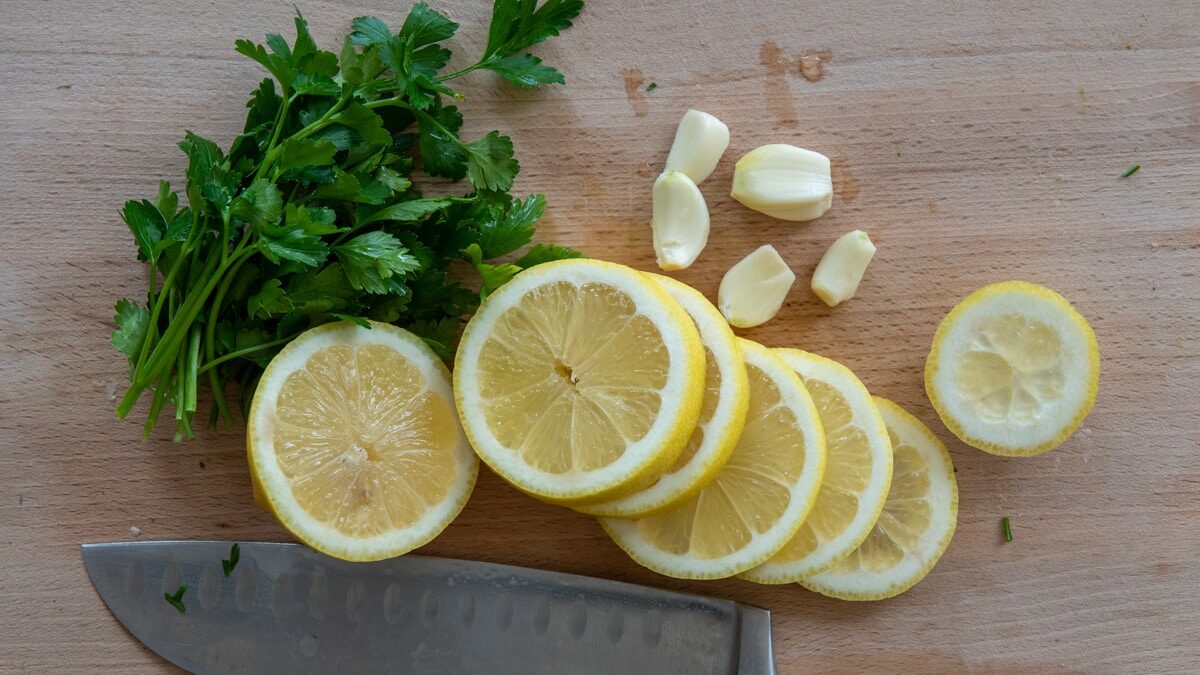 prepare lemon , parsley and garlic