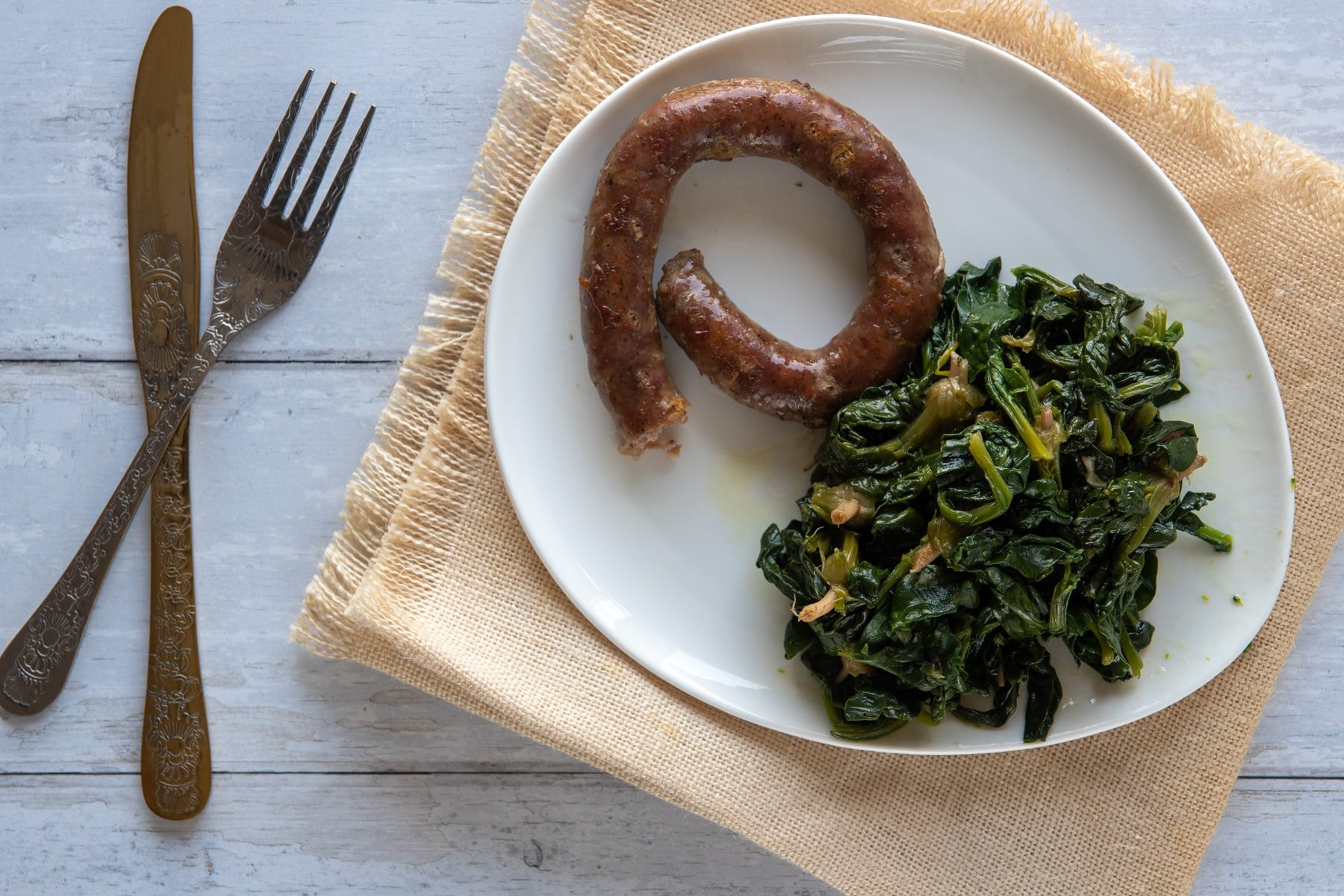sauteed spinach served with sausage