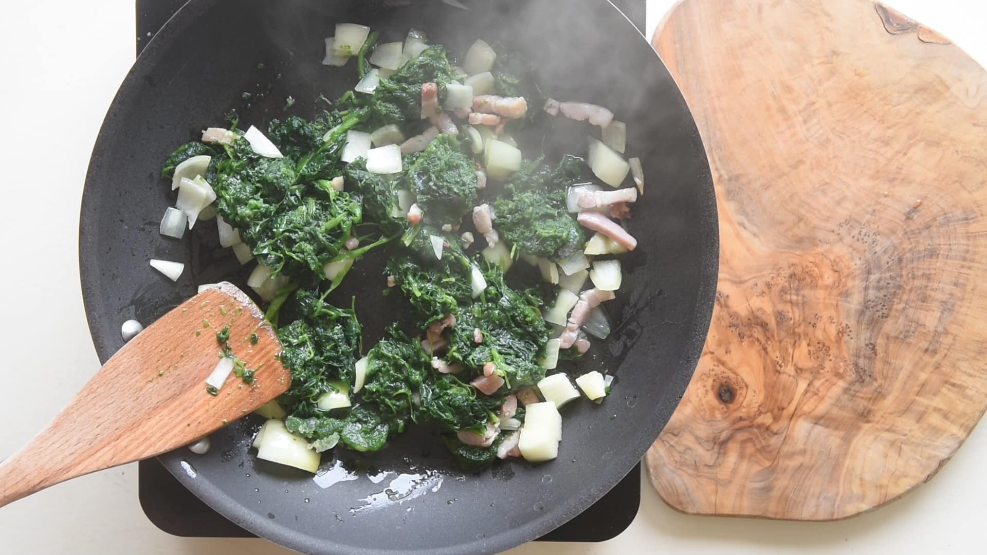 Stir fry the spinach