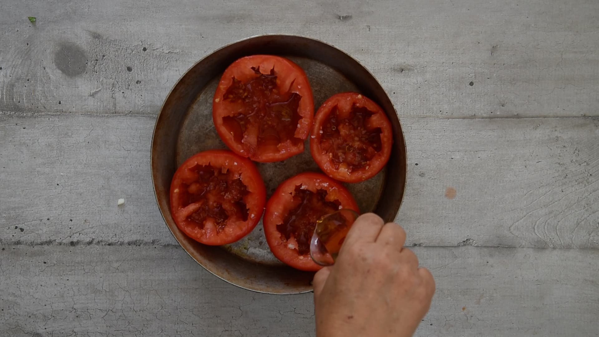 seasoning the tomatoes