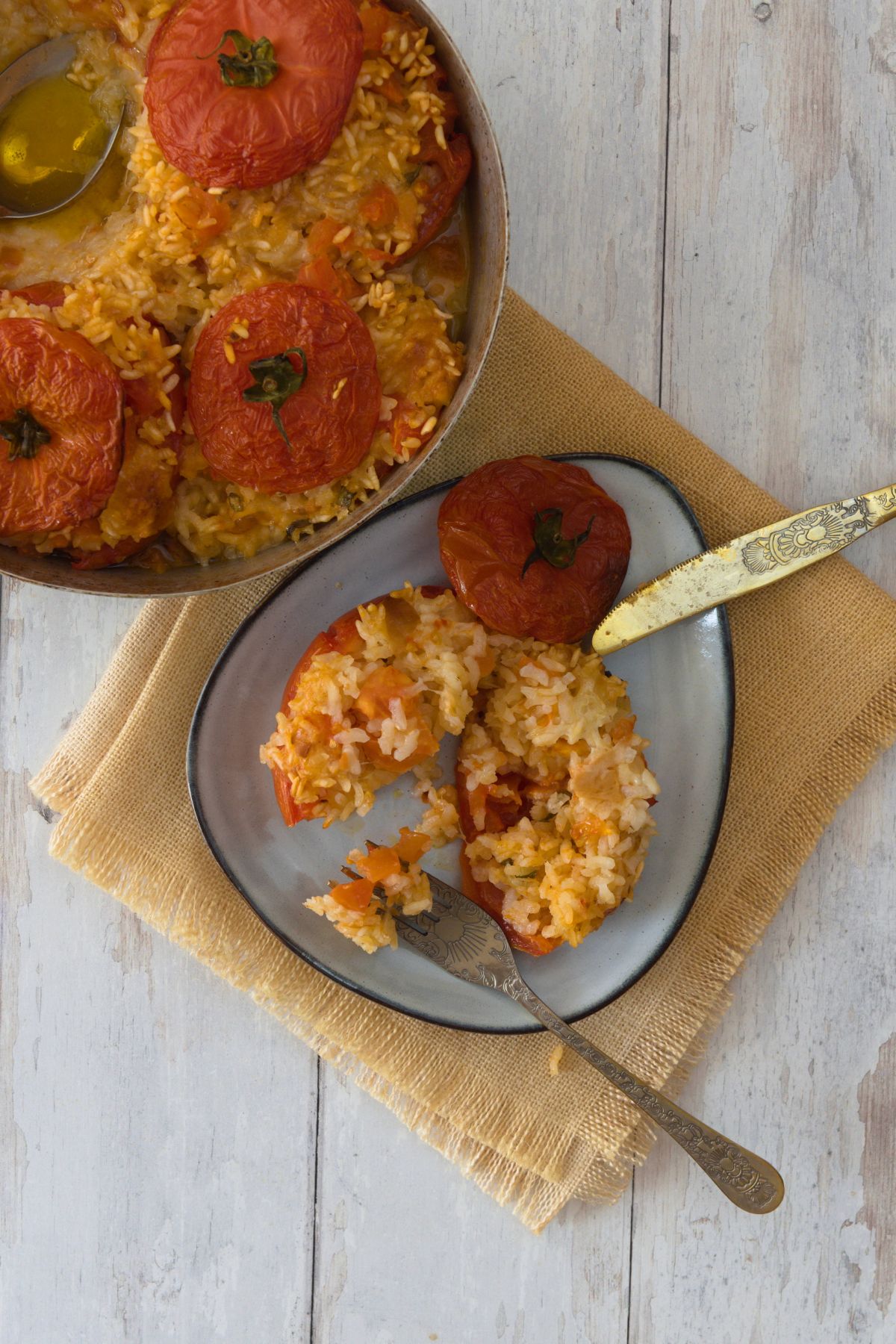 opened rice stuffed tomato