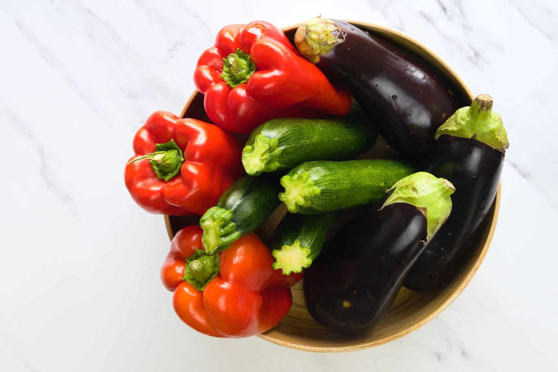 eggplants zucchini and red peppers