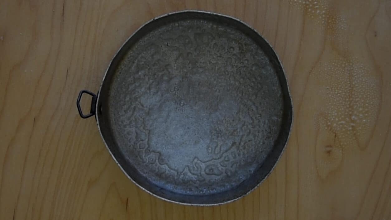 coat a pan with butter