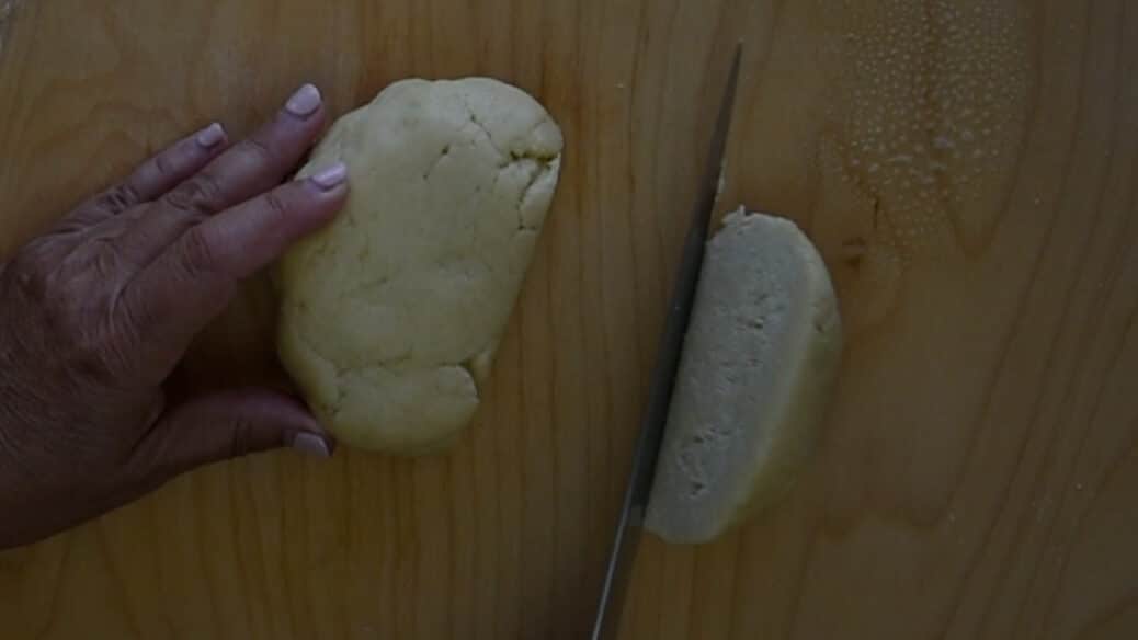 Cut the dough in half