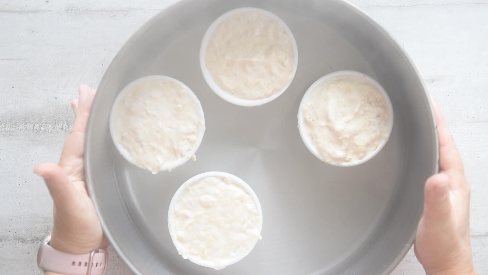 Pour boiling water in the large pan