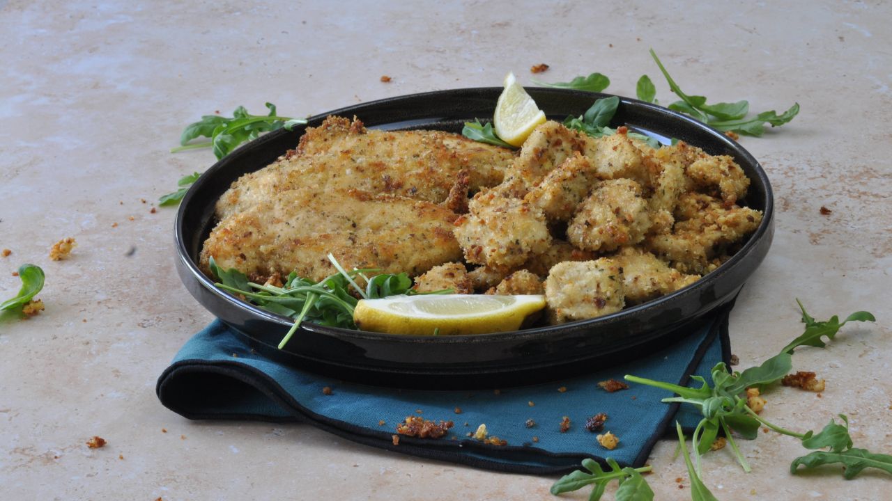 baked chicken cutlet and baked chicken nuggets on the plate