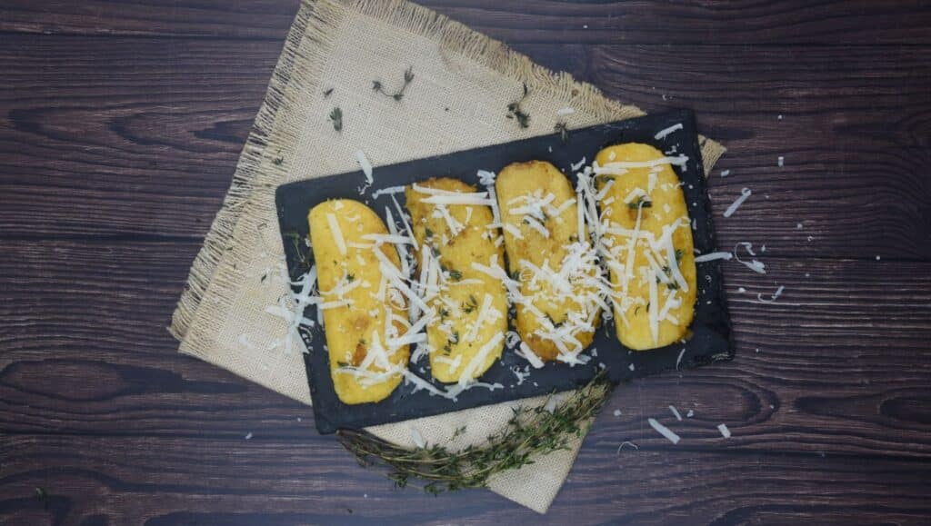 polenta cakes sprinkled with parmesan