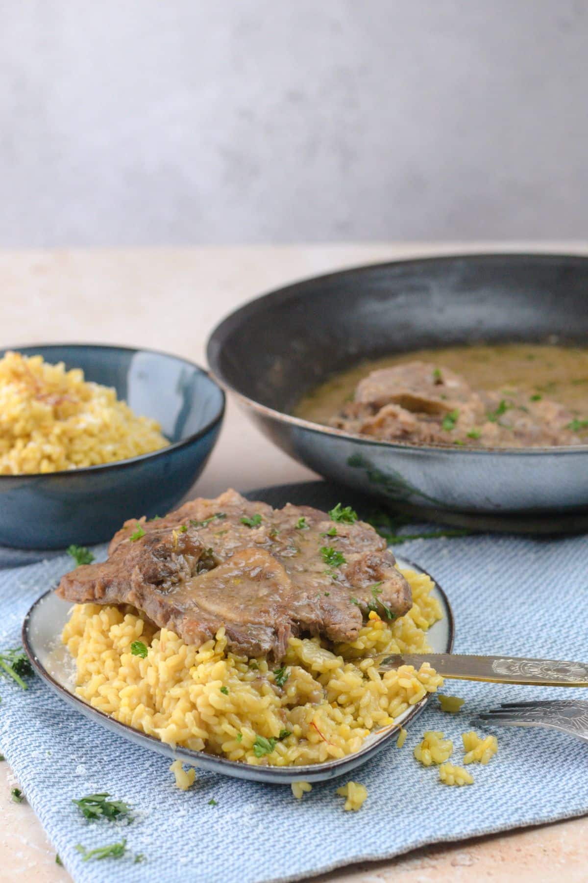Ossobuco alla milanese served with risotto alla milanese