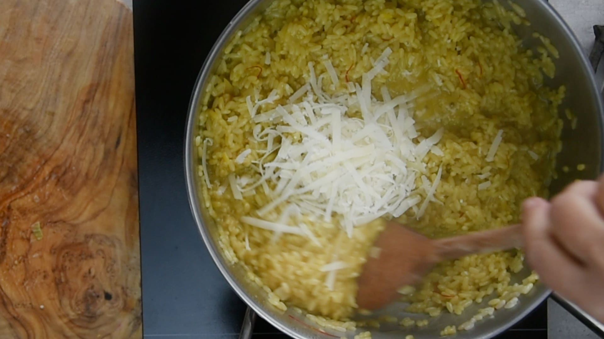 Whisk in a generous amount of freshly grated Parmesan cheese