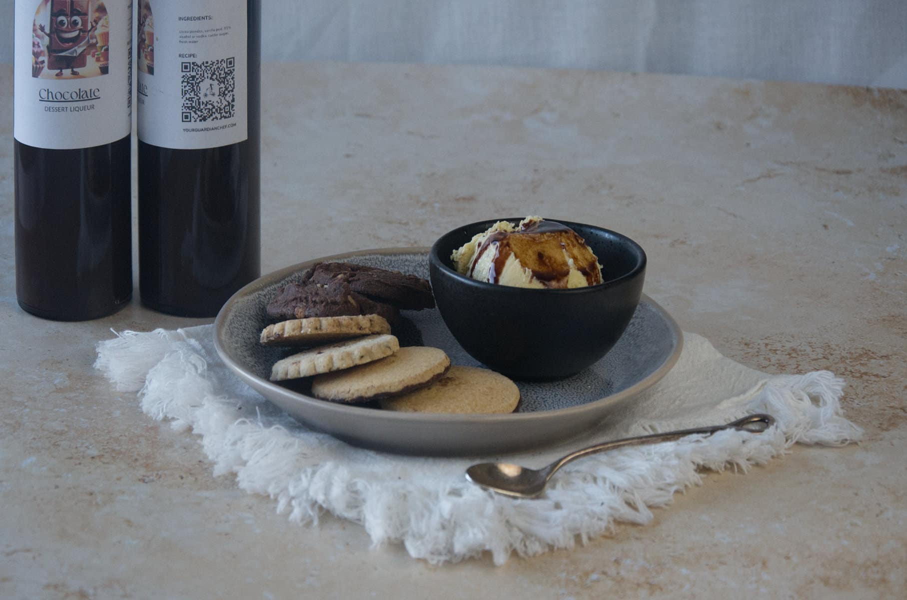 serving the chocolate liqueur over ice cream