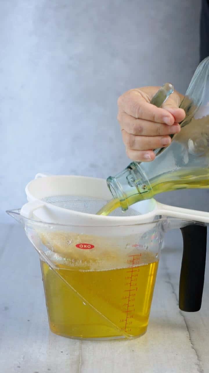 Filter the infused alcohol