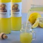 Homemade Limoncello served in bottles with a fun label