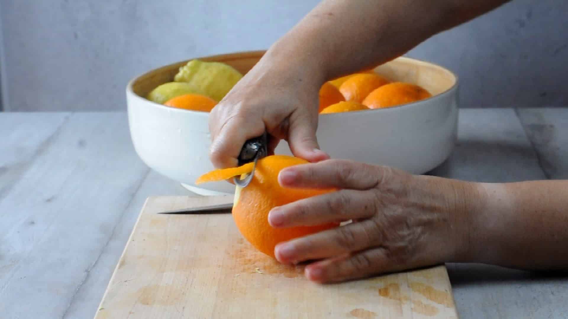 Peeling the oranges