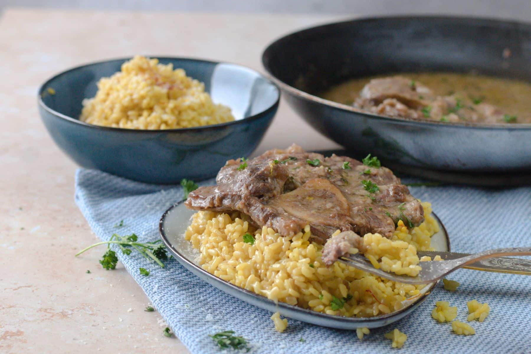 Ossobuco alla Milanese served with risotto alla Milanese