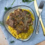 Ossobuco alla Milanese served over the risotto alla milanese