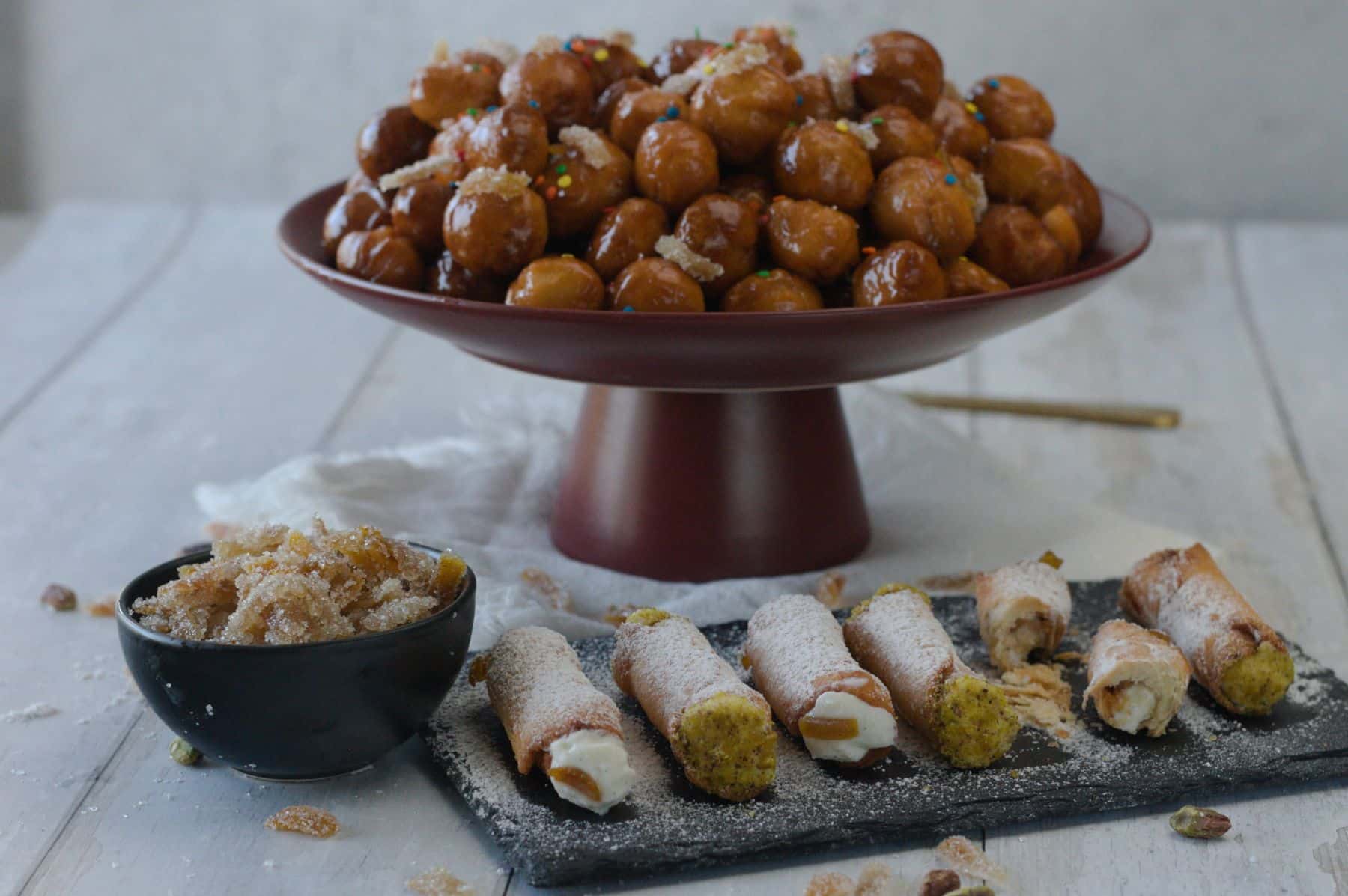 Struffoli served with cannoli