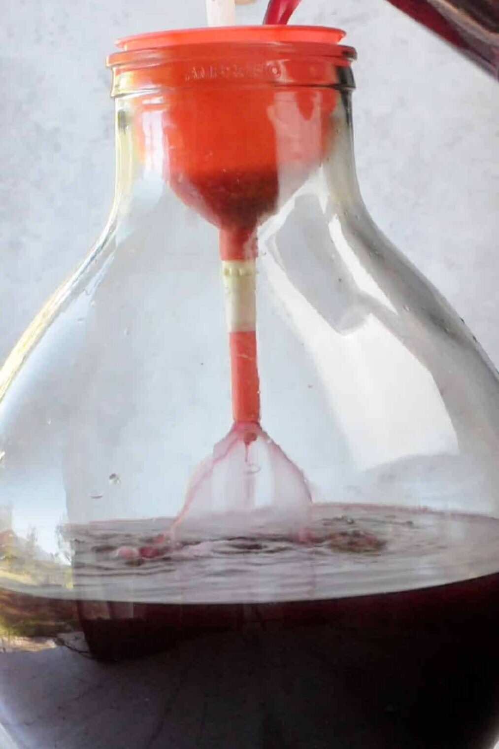 Transfer the wine to remove residuals