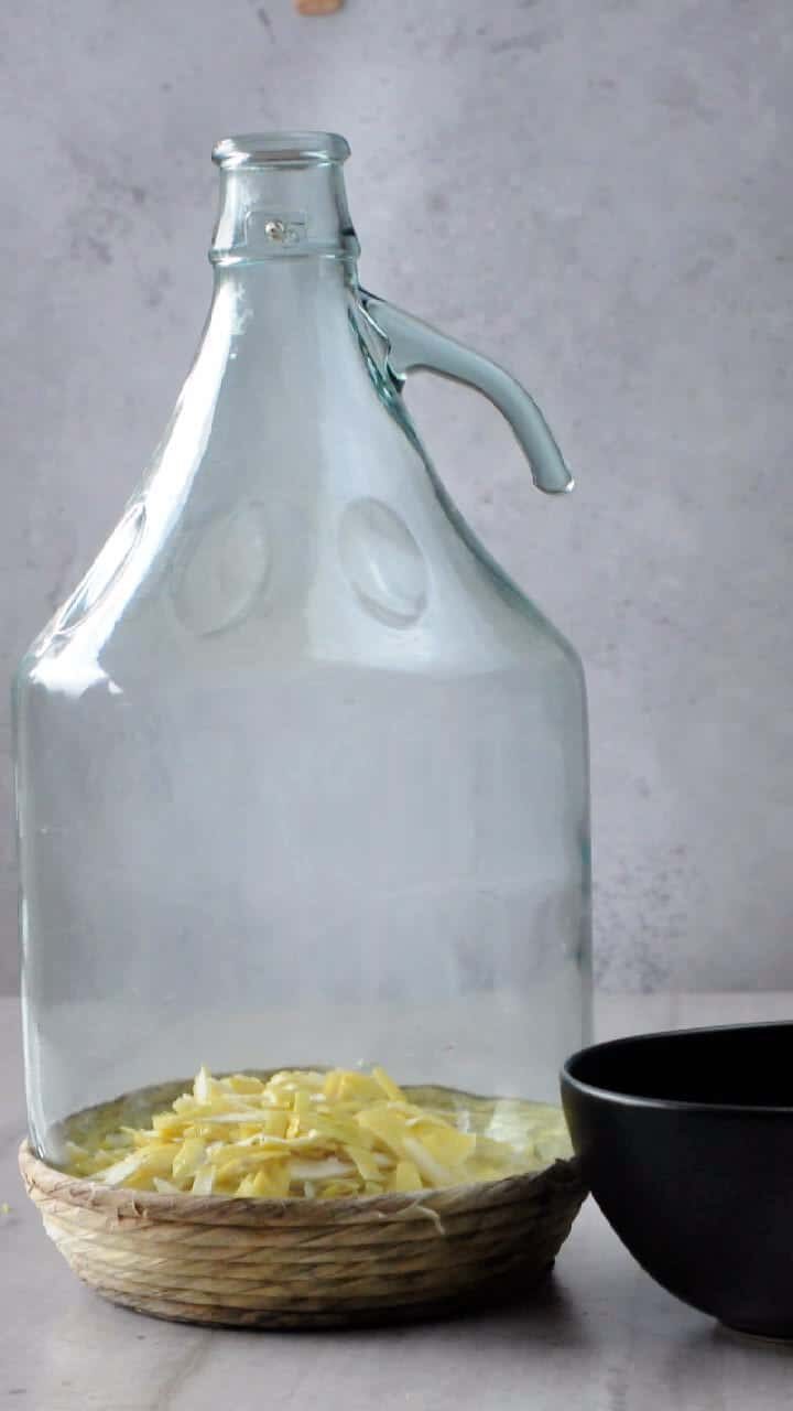 Place the peels in a large bottle