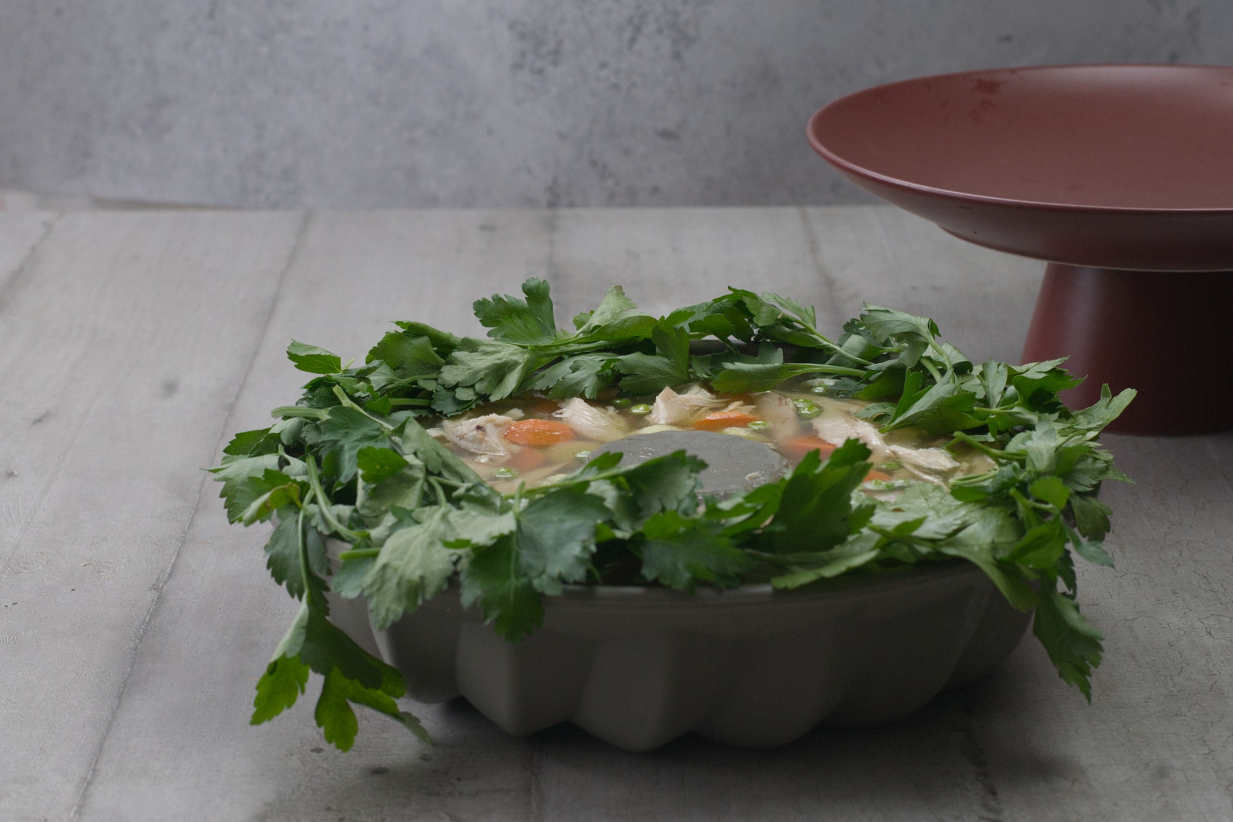 cover the open top of the mold with fresh parsley leaves.