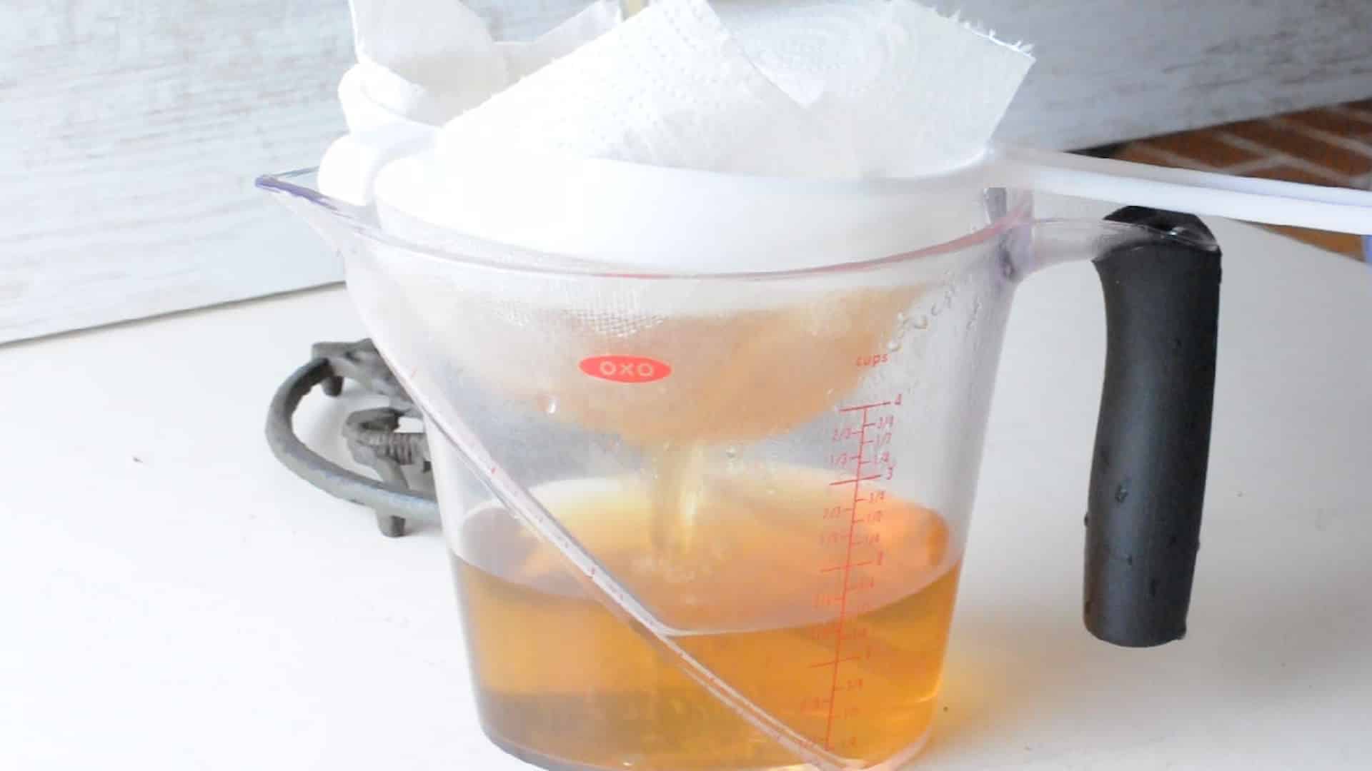 Filter the liquid through a cheesecloth
