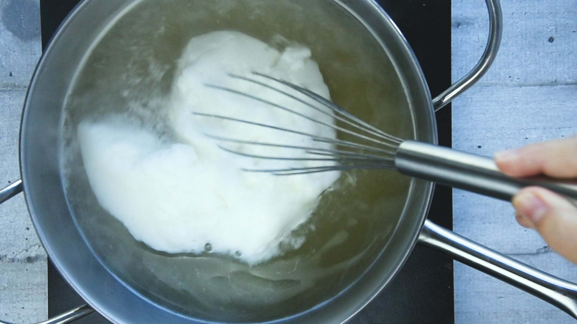 combine the egg white with the stock