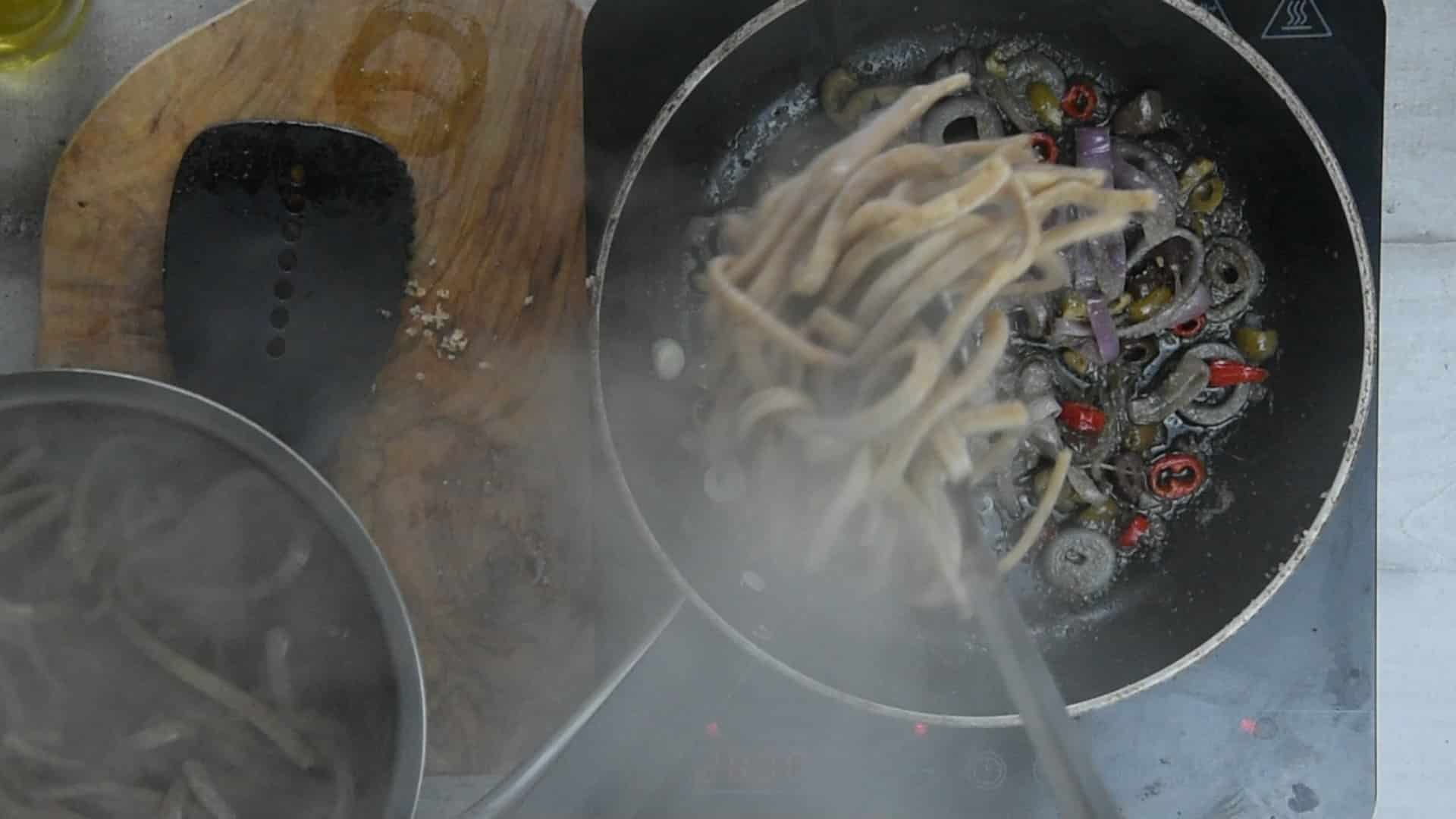 Add the pasta into the pan