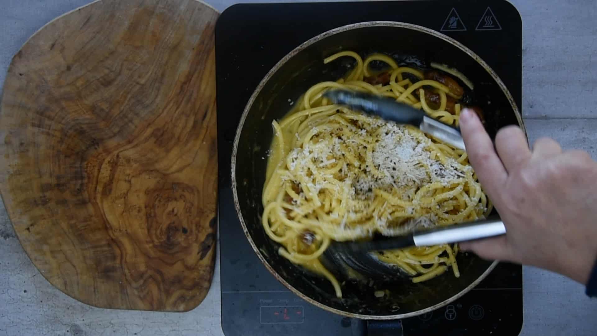 Add the pecorino and black peppers