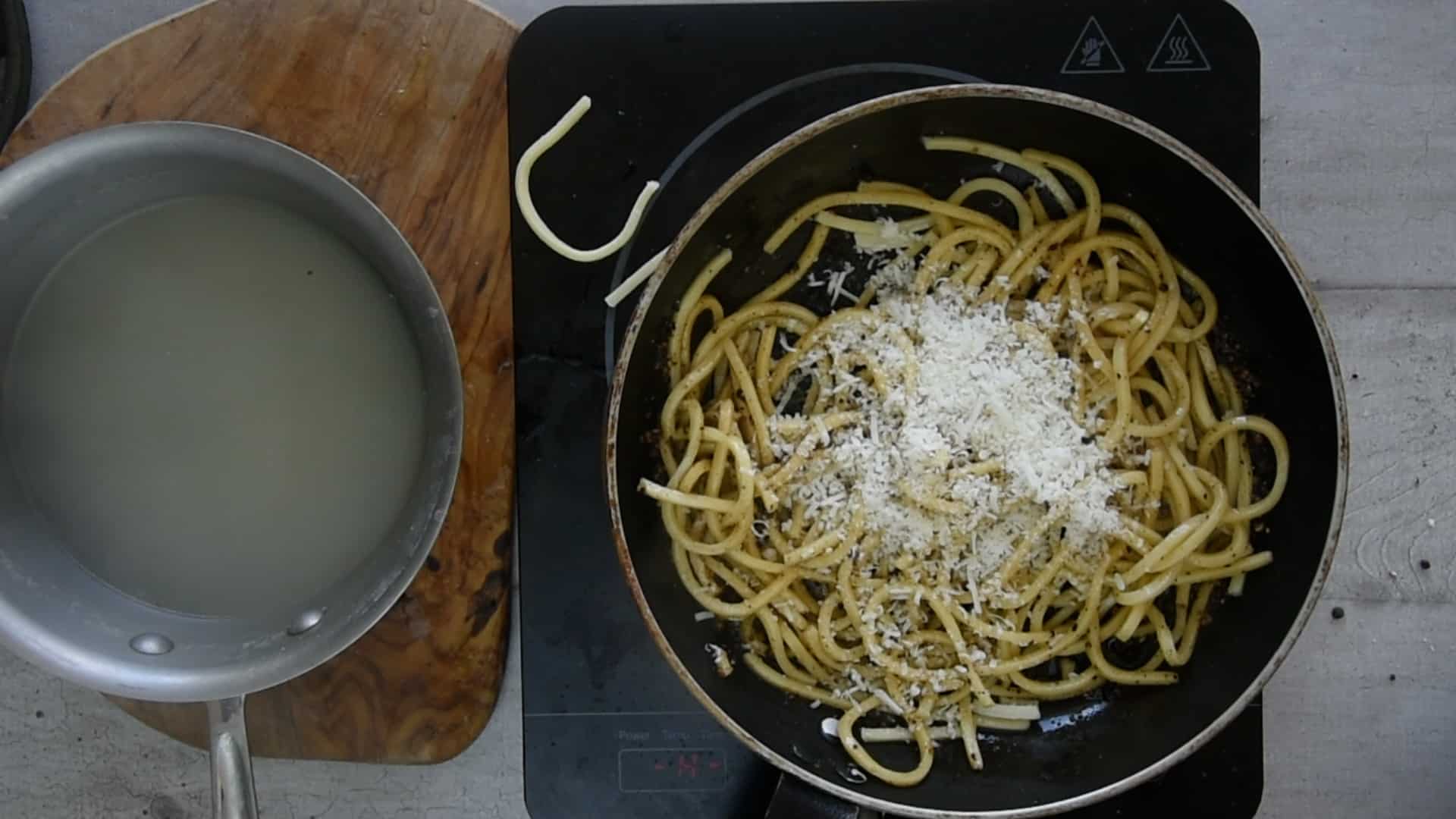 Add the pecorino to the pan