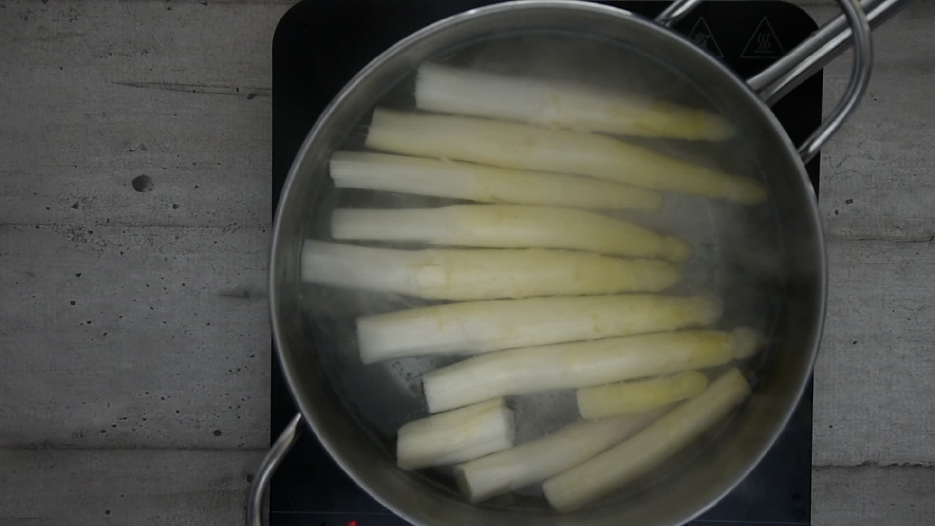 Boil the white asparagus