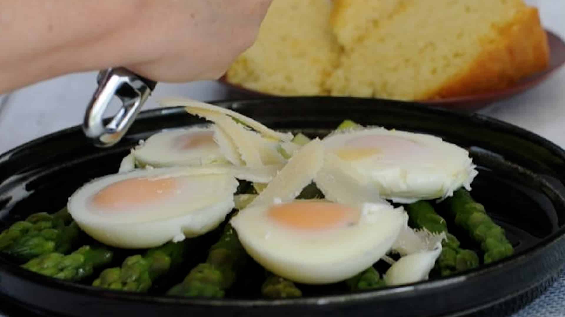 Place the eggs on top and parmesan cheese