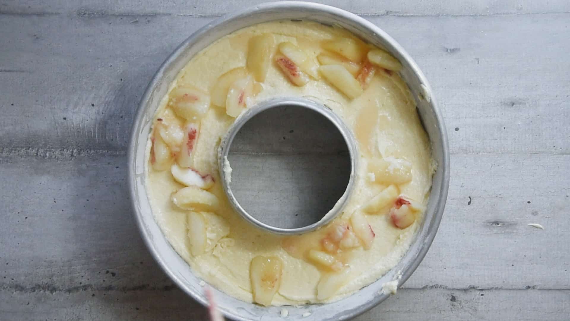 Place the remaining peaches on top