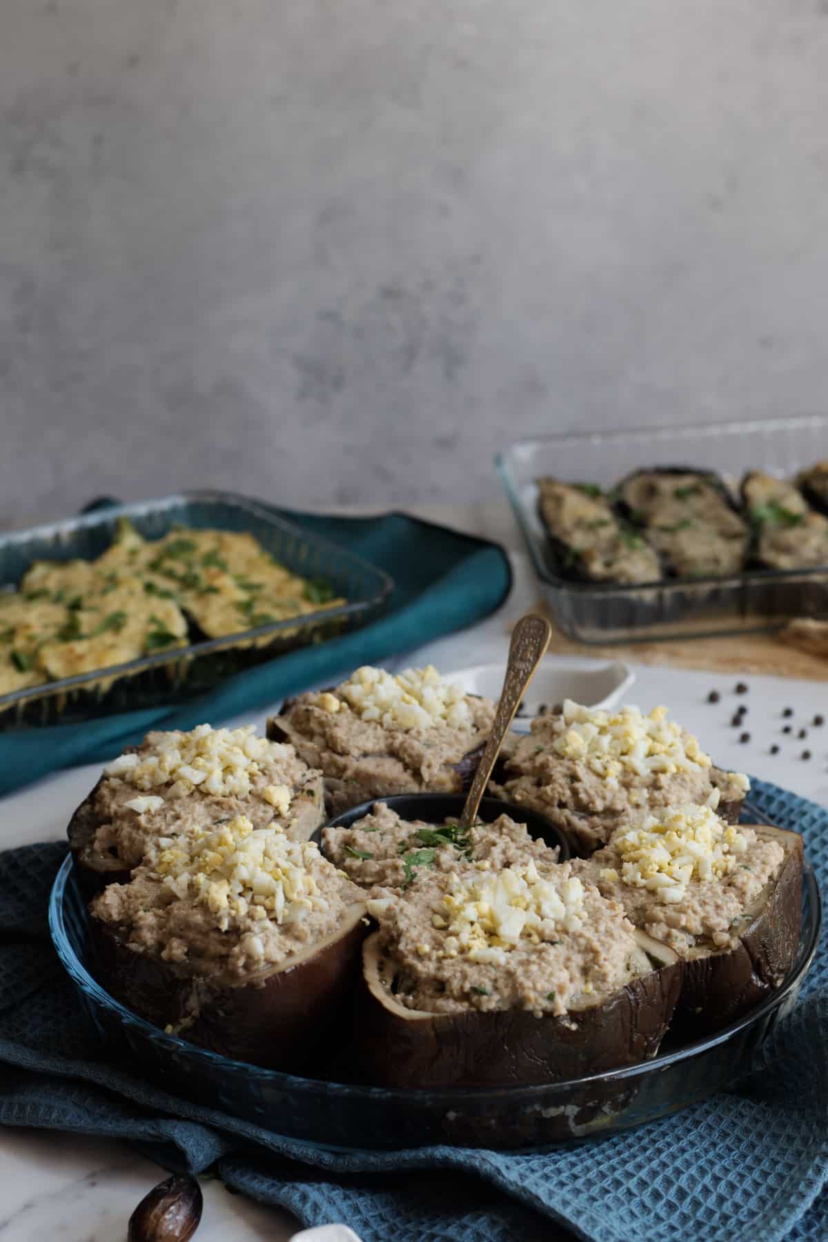 Round stuffed eggplants served with potato stuffed eggplants