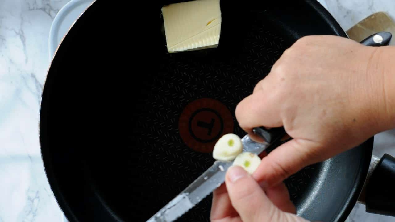 Fry the garlic in butter