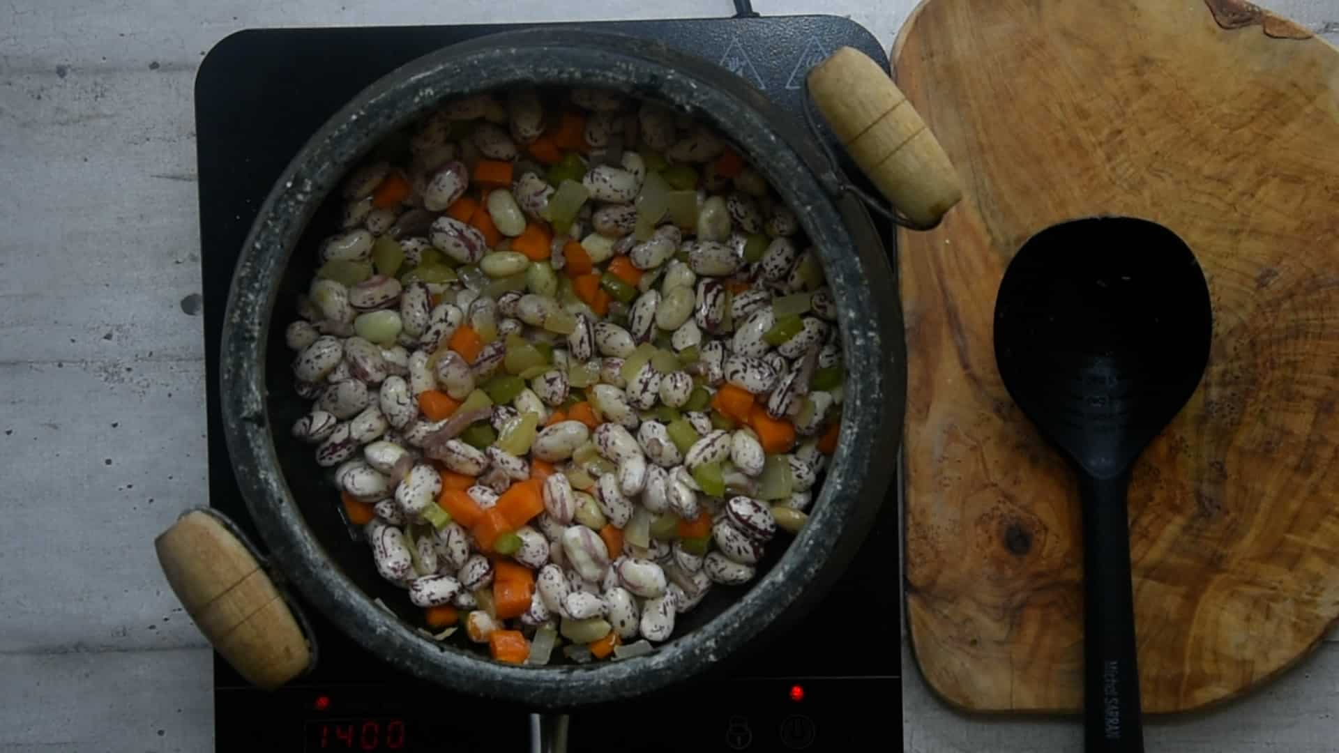 Add the beans and stir