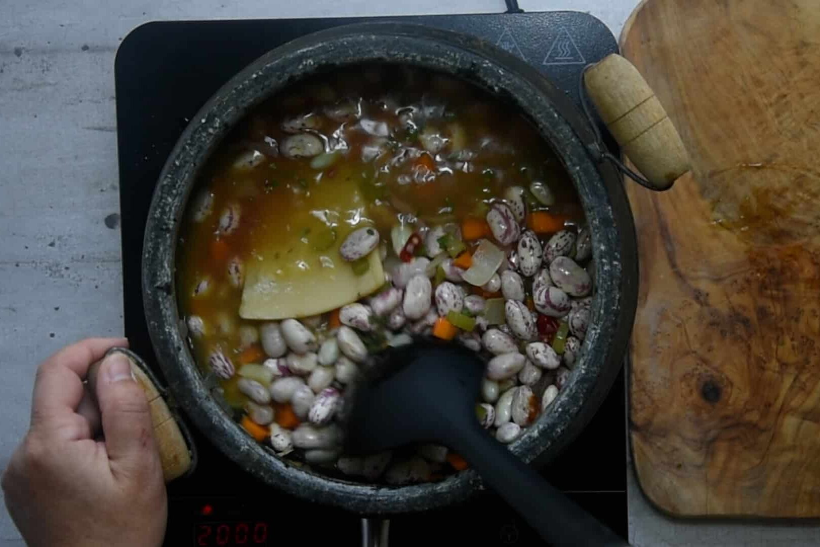 add the rest of the ingredients and cover everything with the stock.
