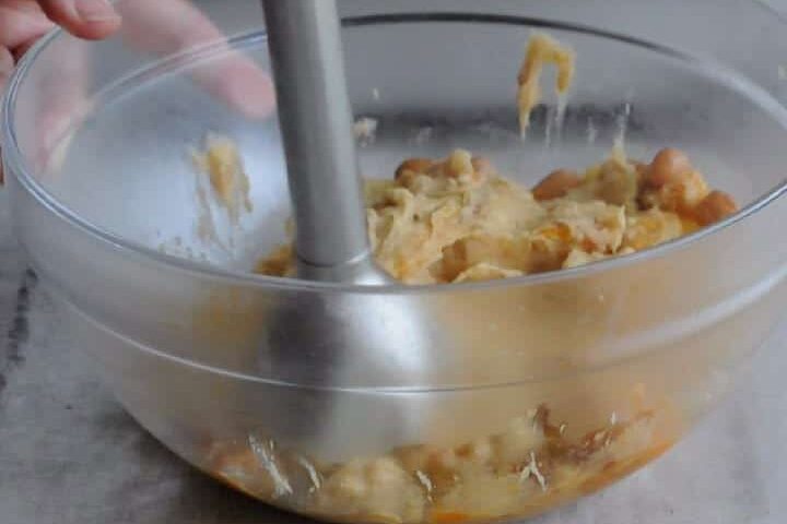 Take out some of the beans with the potatoes, blend them
